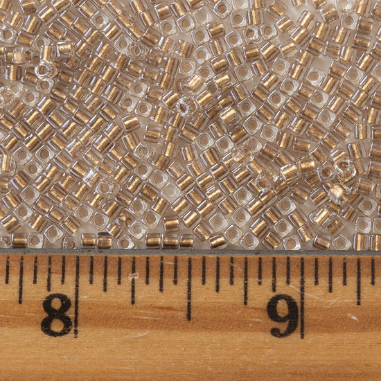 1.8mm Miyuki Cube Beads  - Gold Lined Crystal - 20 grams