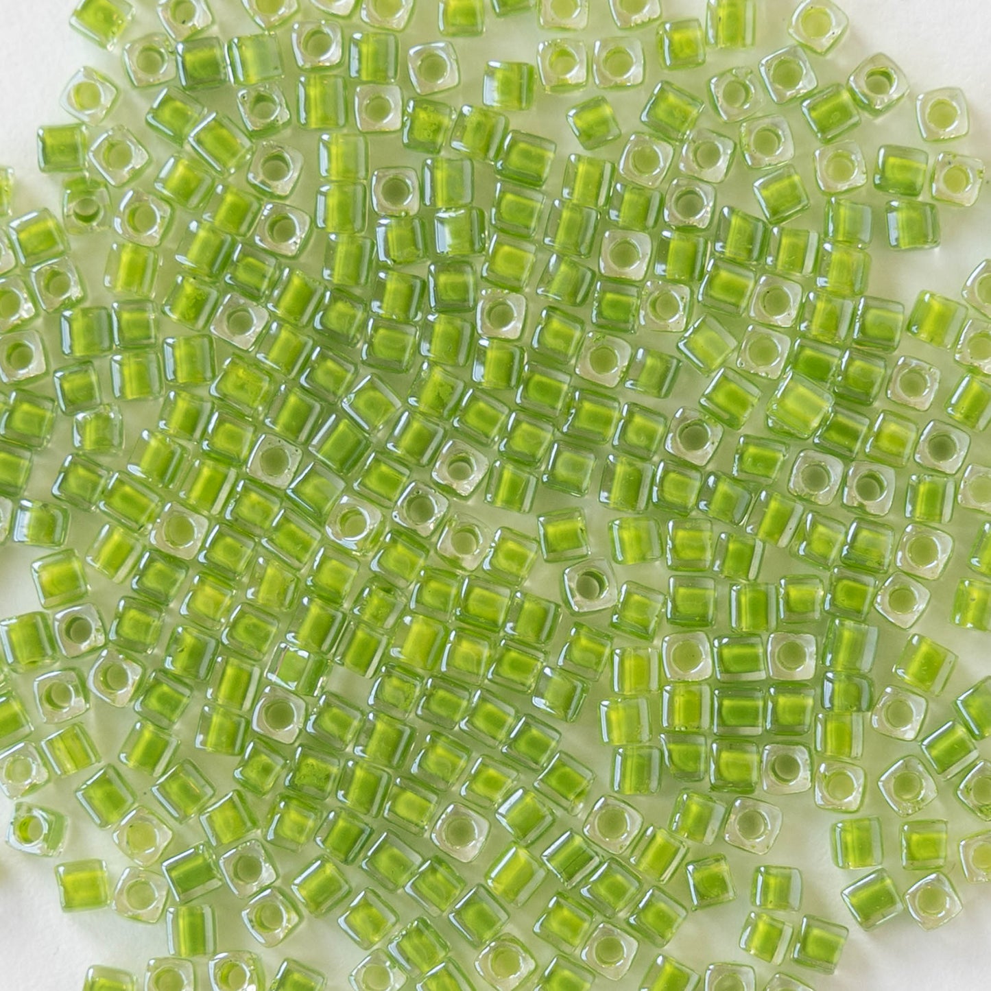 1.8mm Miyuki Cube Beads  - Color Lined Lime in Crystal - 20 grams