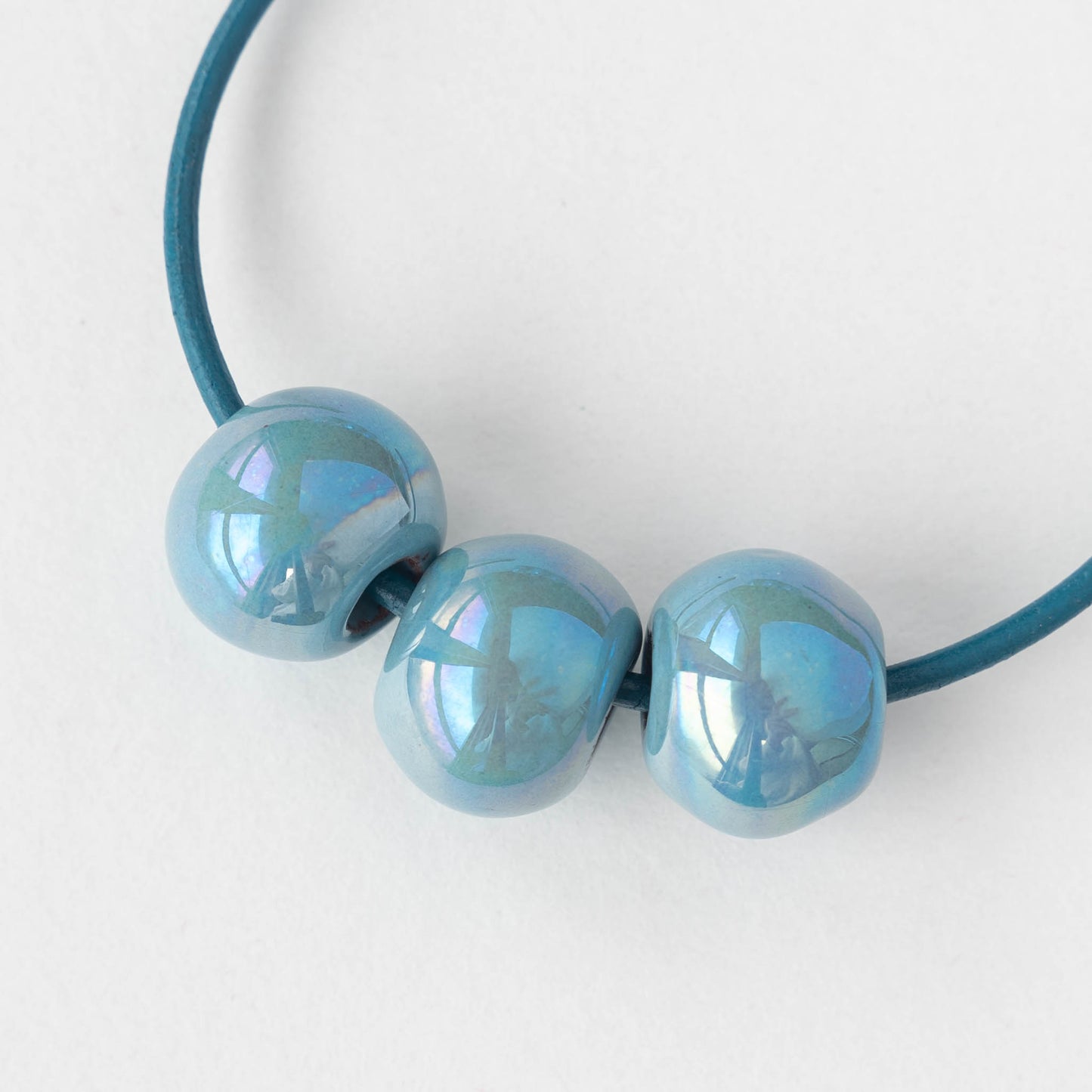 16mm Glazed Ceramic Round Beads - Iridescent lt. Blue - 4 or 12