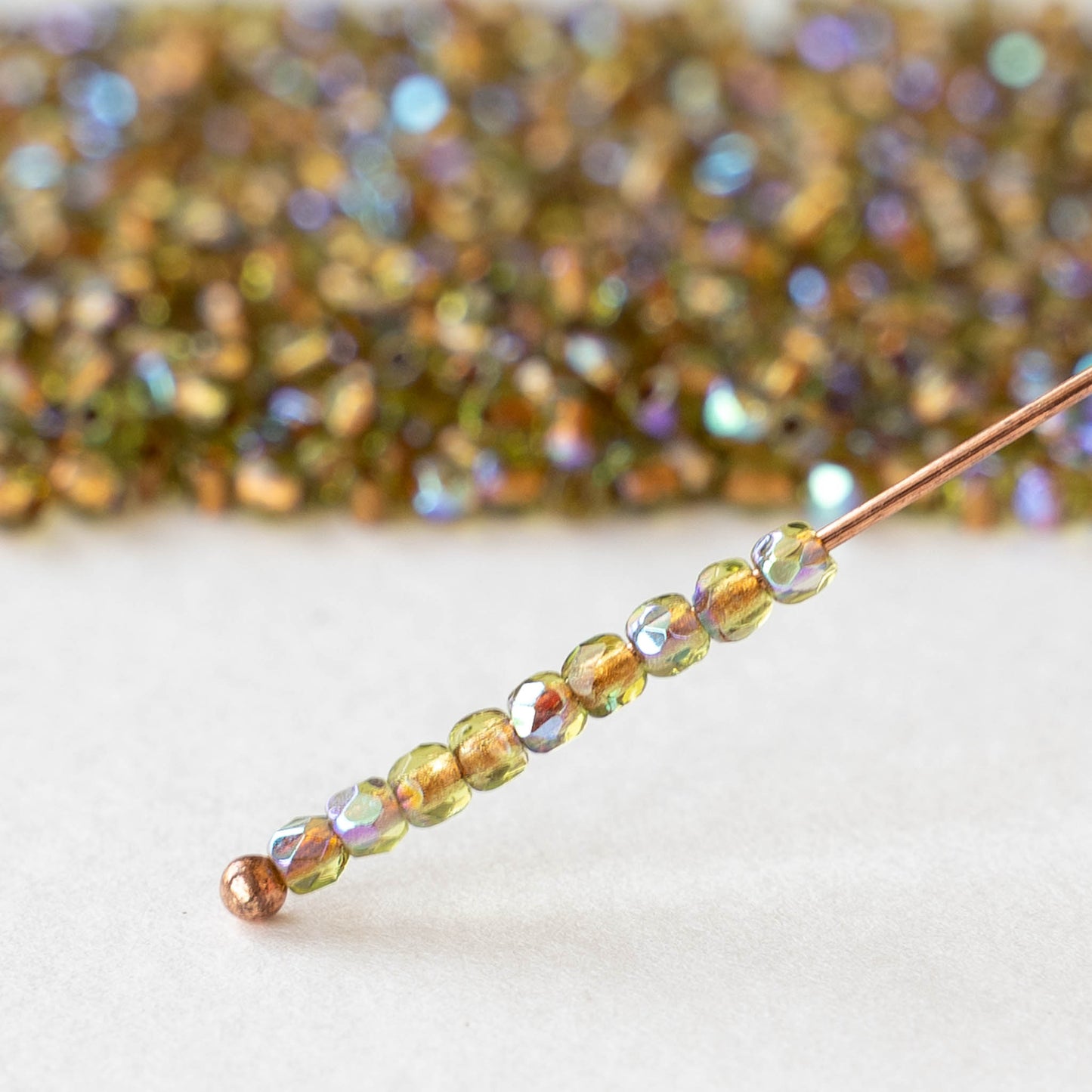 2mm Round Firepolished Beads -Copper Lined Olive AB - 50 beads