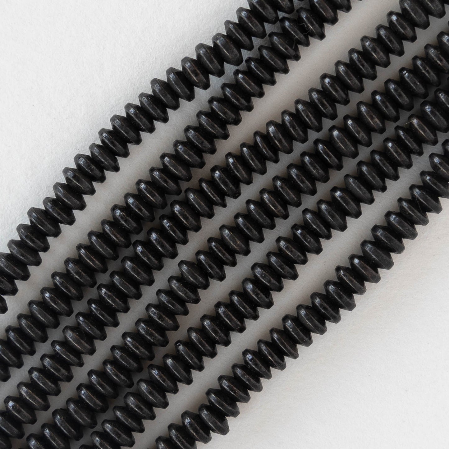 4mm Black Brass Flying Saucer Disk Beads - 60