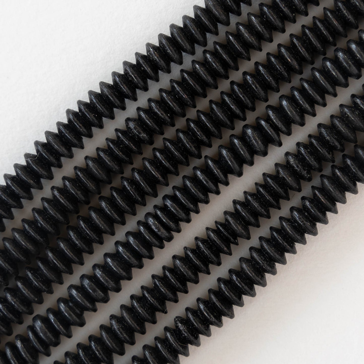 5mm Black Brass Saucer Beads - 50