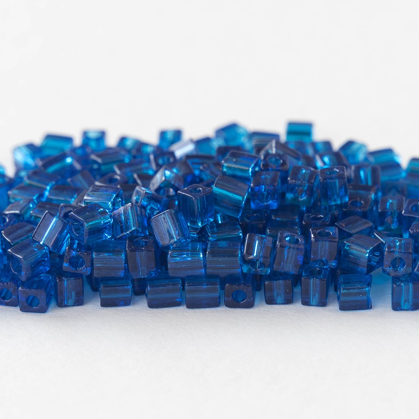 4mm Miyuki Cube Beads  - Transparent Capri Blue - 20 grams