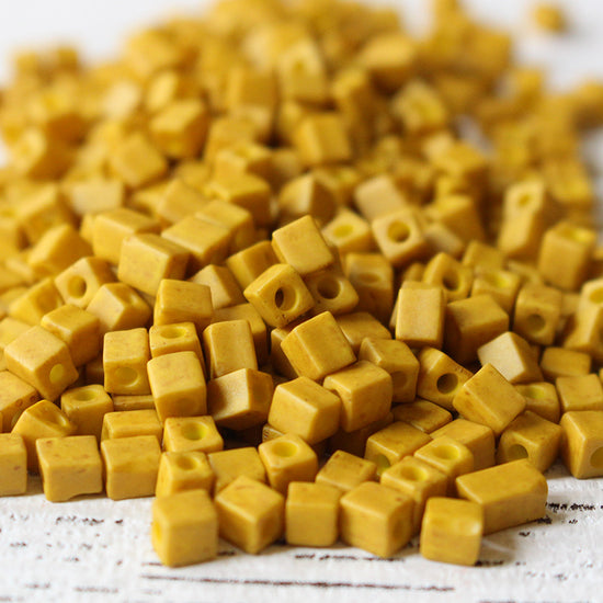 4mm Miyuki Cube Beads  - Opaque Ochre Yellow - 10 grams