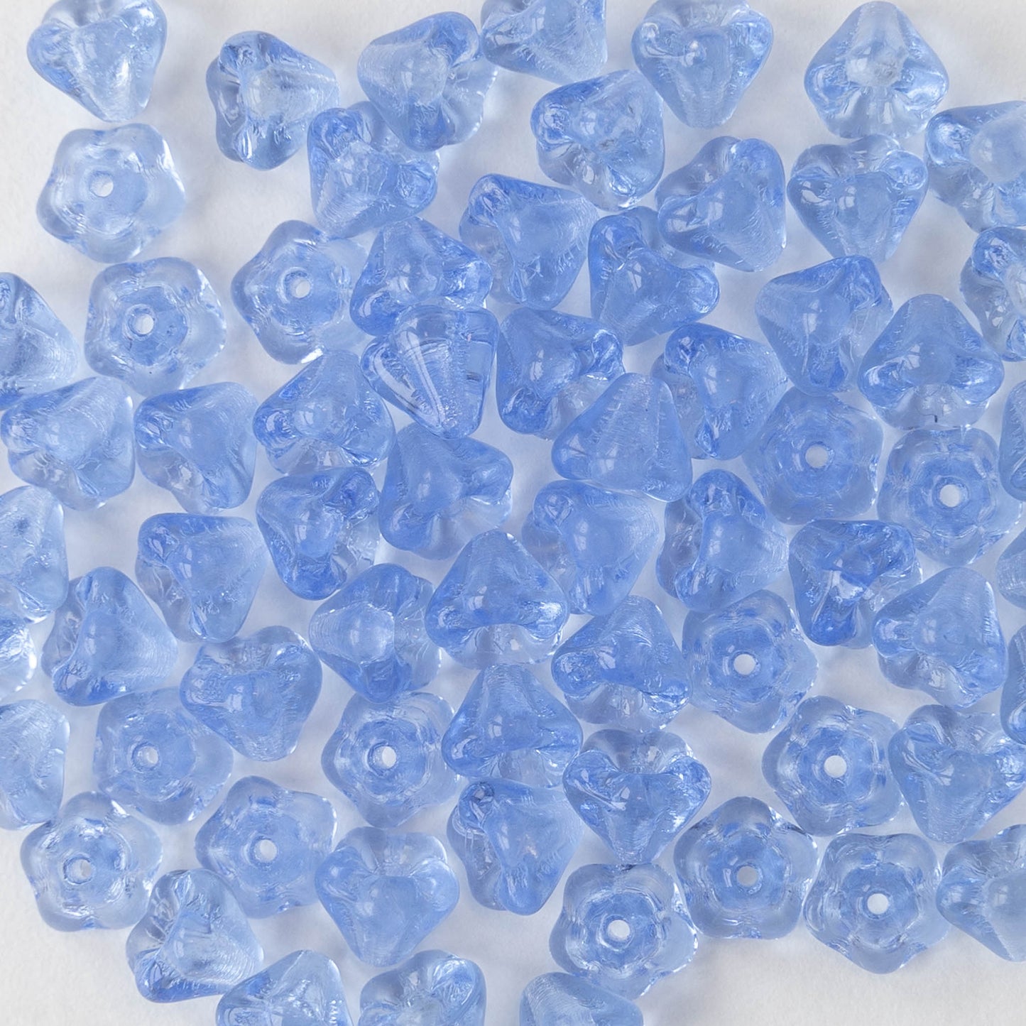 4x6mm Glass Flower Beads - Lt. Sapphire Blue - 75