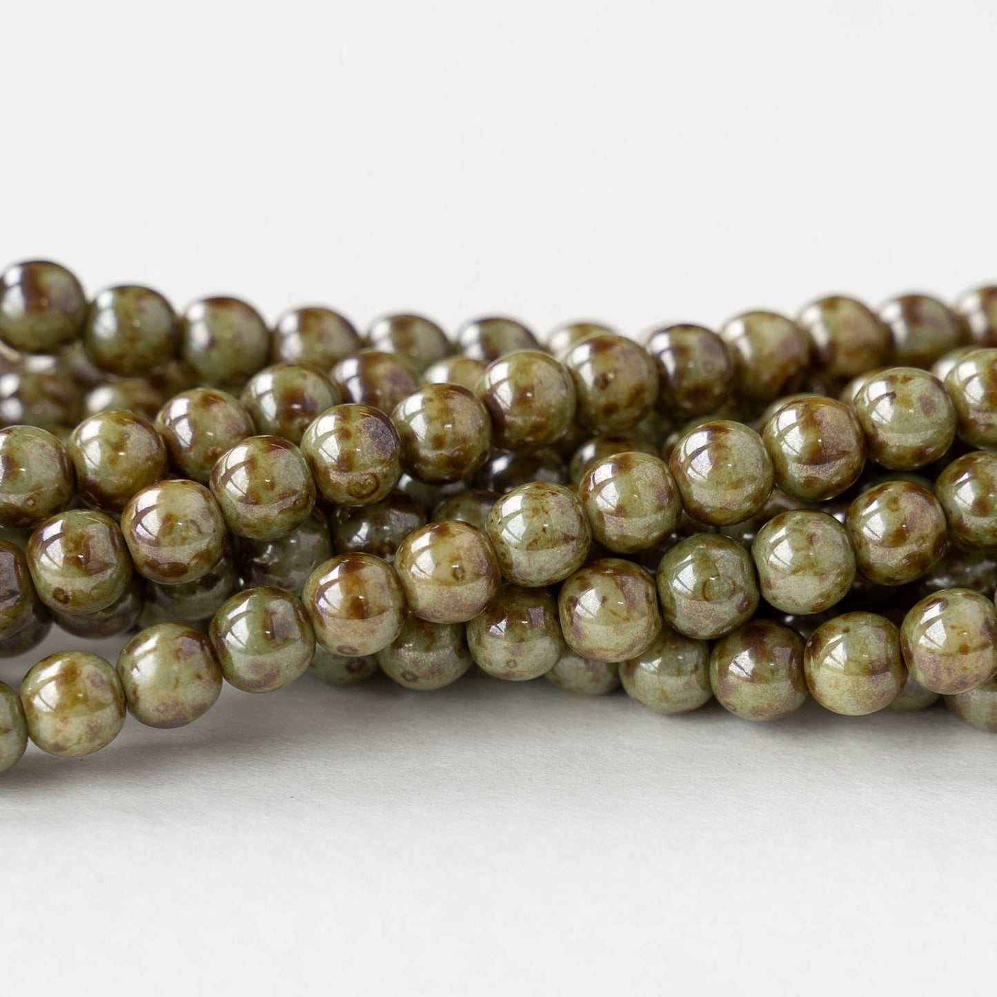 5mm Round Glass Beads - Green Picasso Luster - 50 Beads