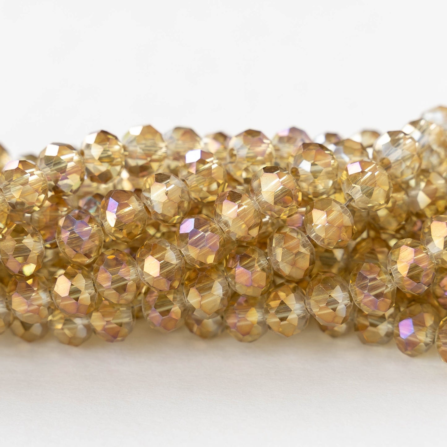 5x6mm Faceted Rondelle Beads - Champagne Luster Rainbow  - 16 inch strand ~85 beads