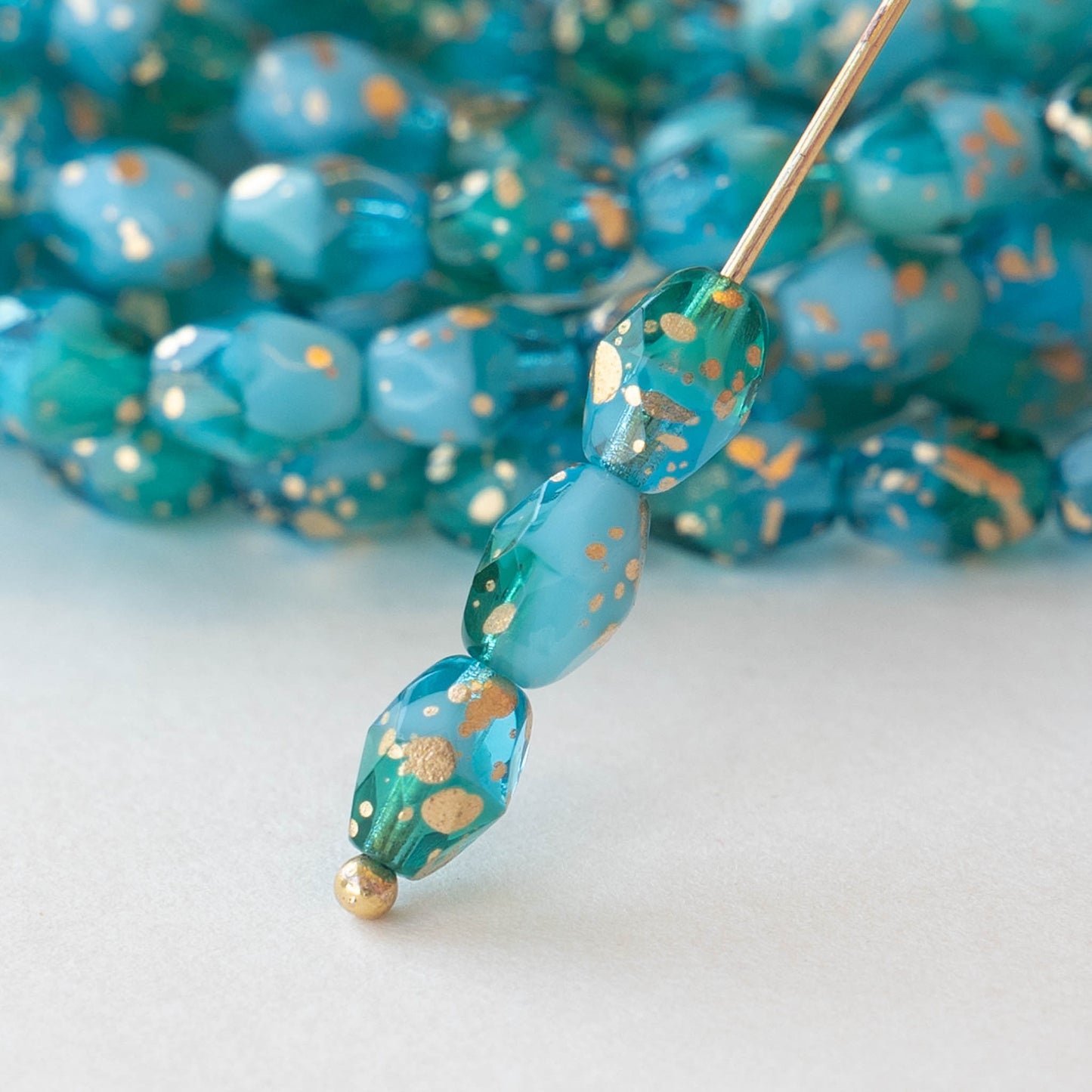 5x7mm Oval Beads - Aqua and Teal with Gold Dust - 20 beads