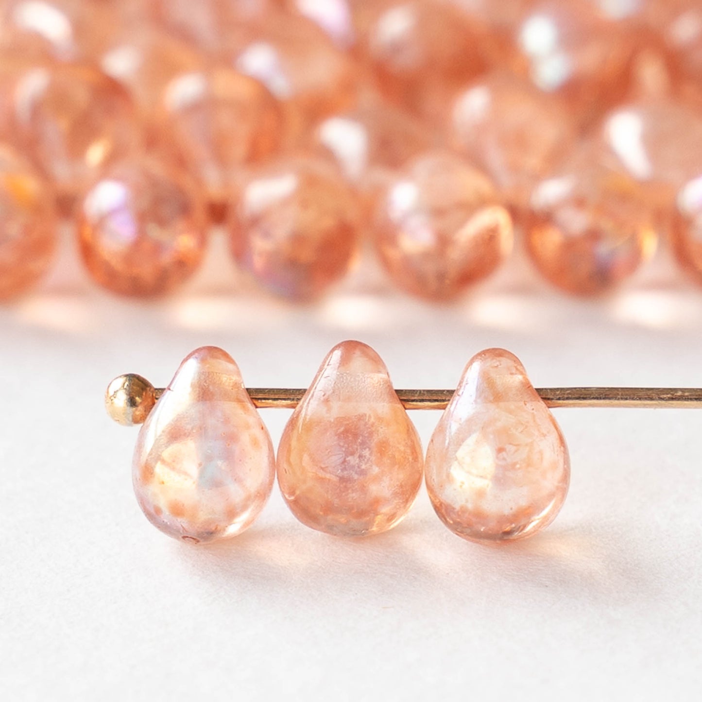 5x7mm Glass Teardrop Beads - Transparent Mottled Peach AB - 50 Beads