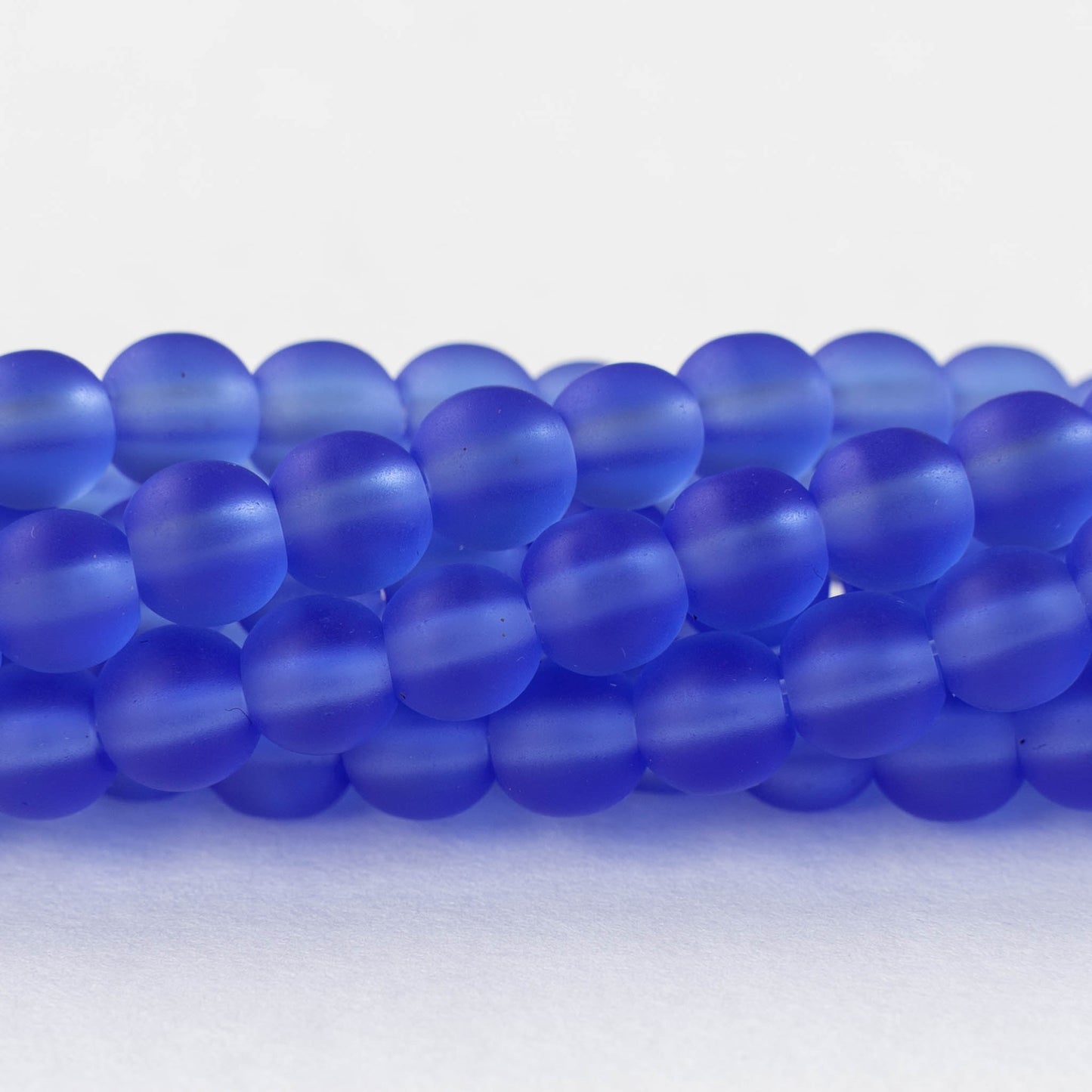 6mm Frosted Glass Rounds - Lt Sapphire Blue - 16 Inches