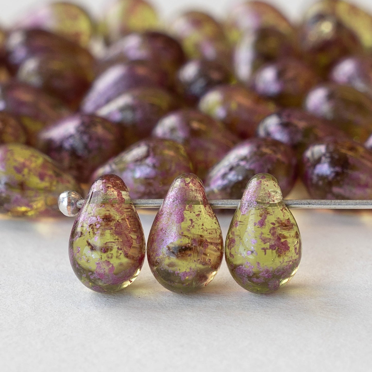 6x9mm Glass Teardrop Beads - Light Peridot with Pink Wash - 50 Beads