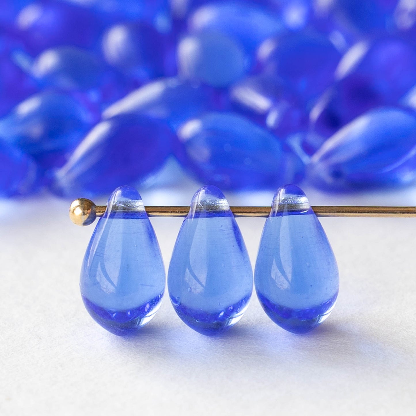 6x9mm Glass Teardrop Beads - Transparent Sapphire Blue - 50 Beads
