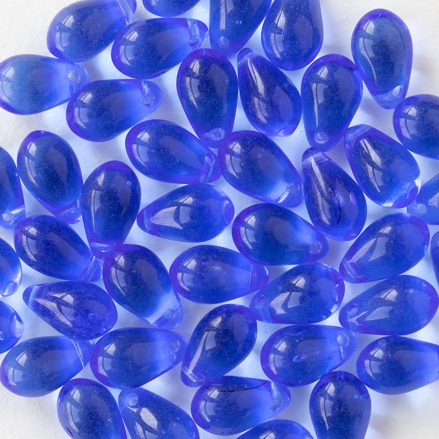 6x9mm Glass Teardrop Beads - Transparent Sapphire Blue - 50 Beads