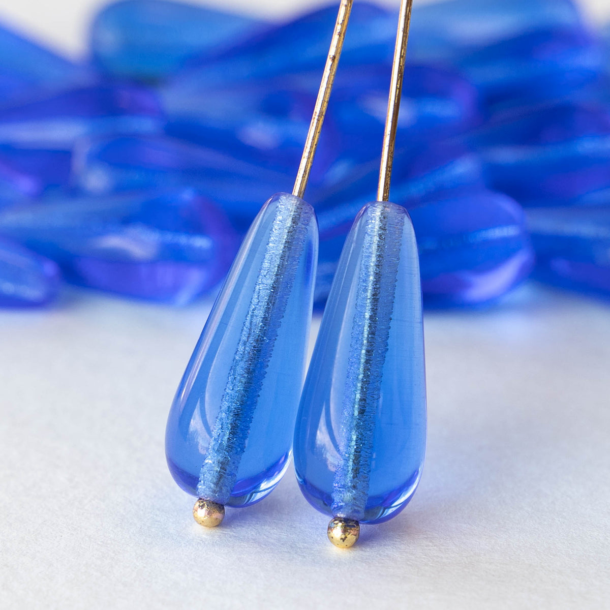 Six Czech glass long faceted teardrop beads - transparent sapphire blu –  Glorious Glass Beads