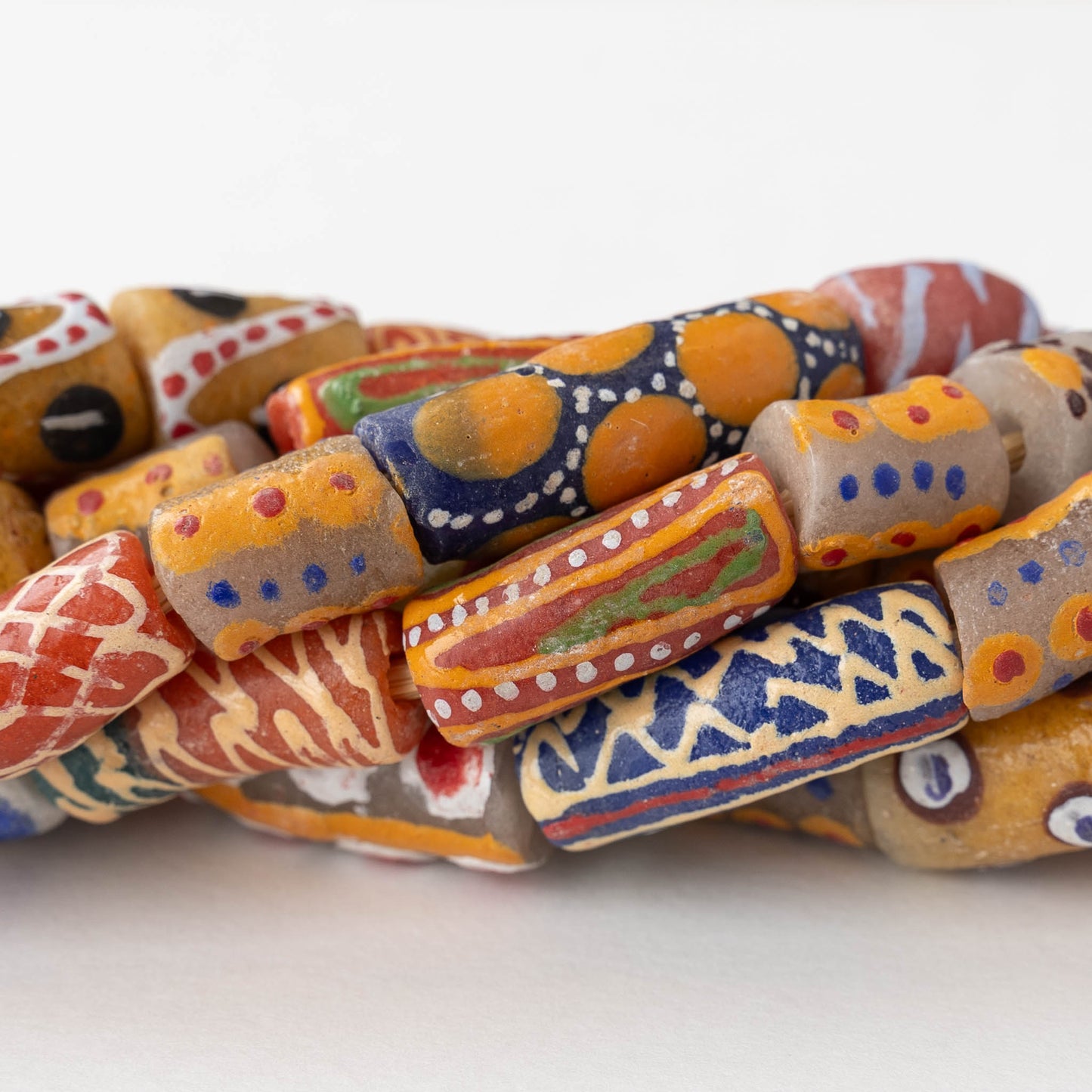 Painted Tube Beads From Ghana Africa - Warm Color Mix - 25 inch strand ~30 Beads