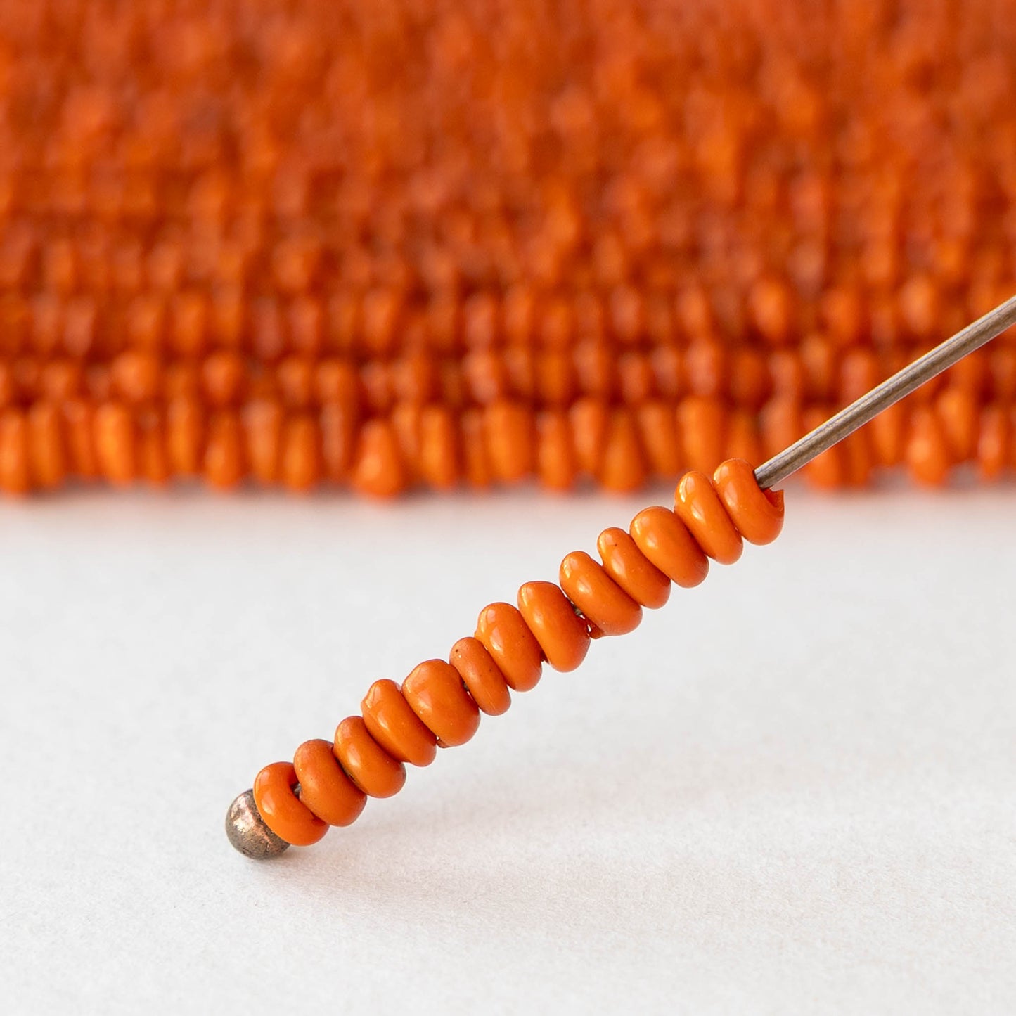 Rustic Indonesian Glass Ring Beads - Opaque Orange - Whole or Half Strand