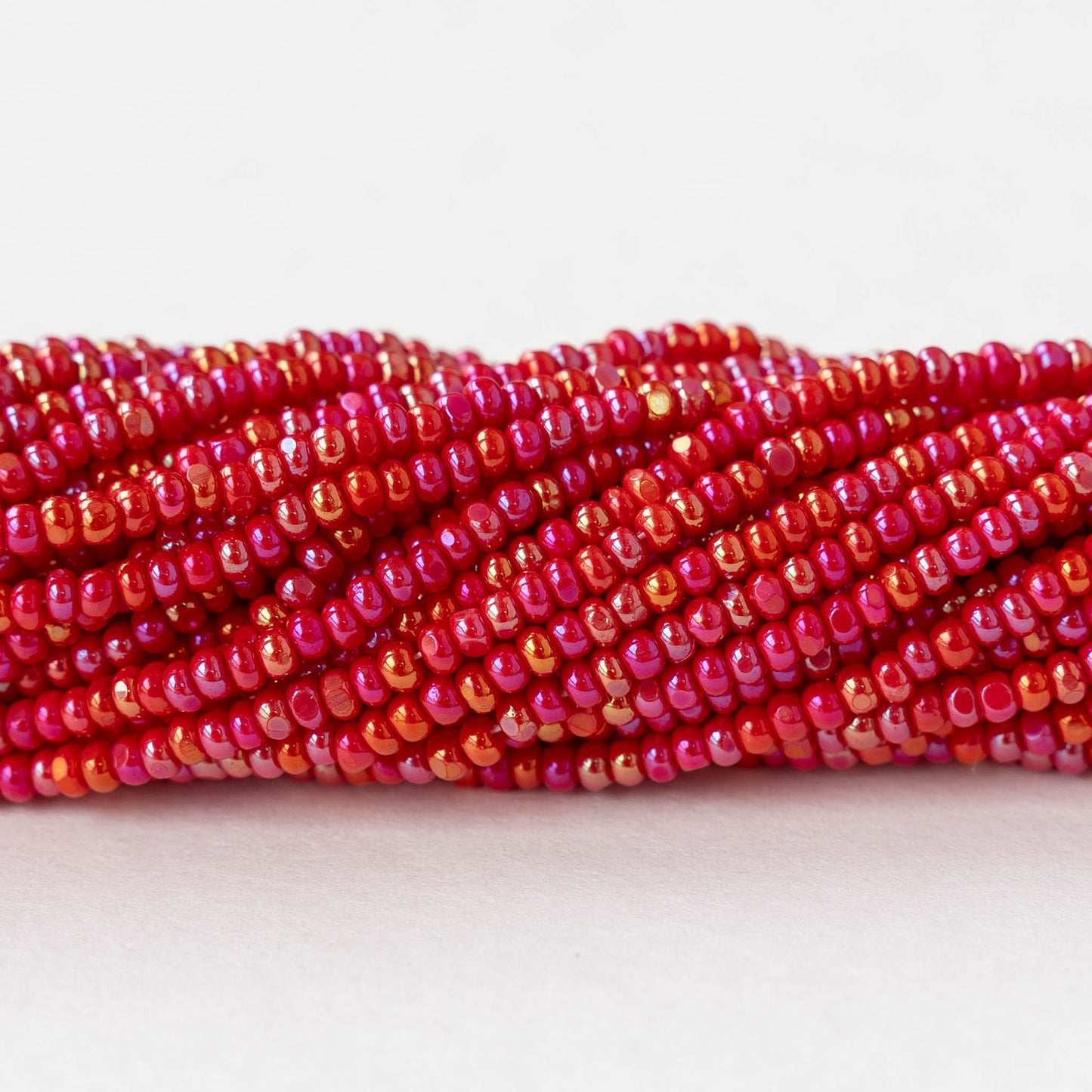 11/0 Seed Beads - Opaque Red Iris - 20 inch strands - Whole or Half hank