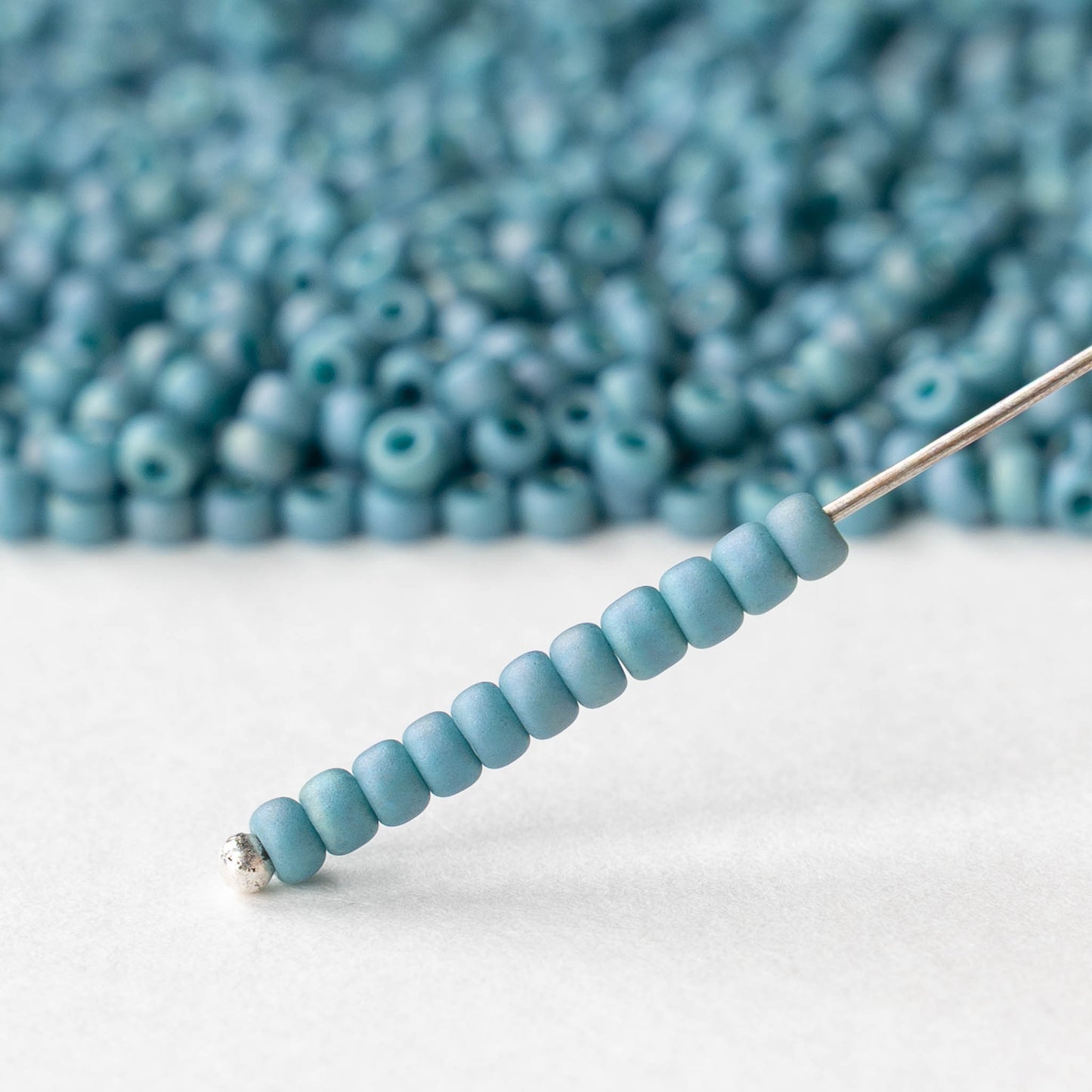 Size 8/0 Glass Seed Beads - Peacock Rainbow - 10 grams