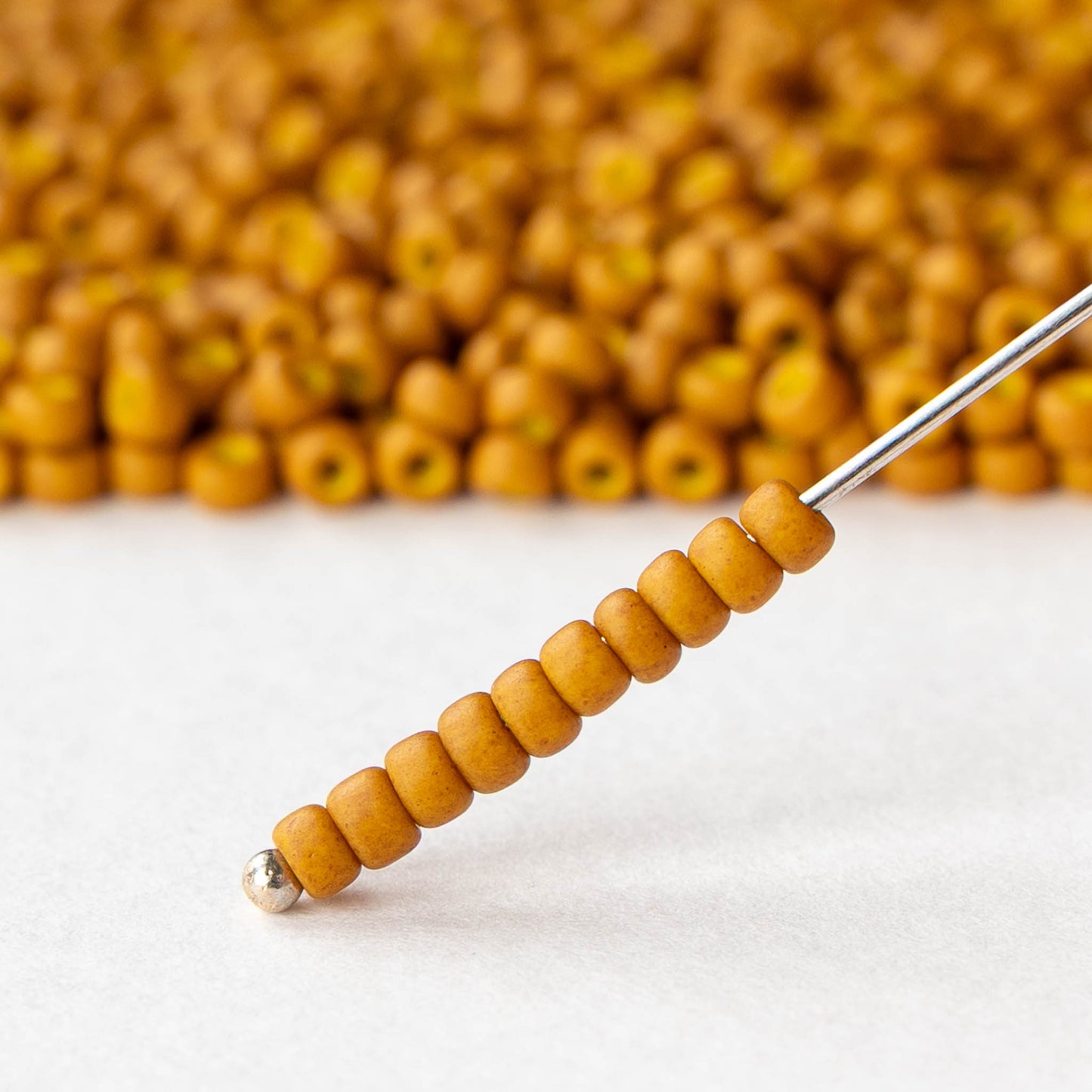 Size 8/0 Glass Seed Beads - Matte Opaque Mustard - 10 grams
