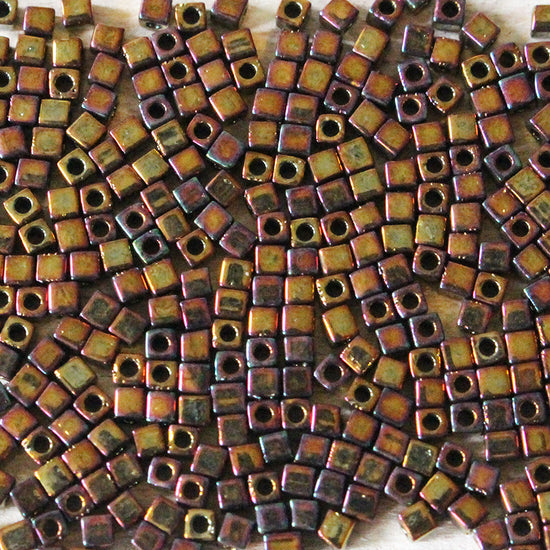 1.8mm Miyuki Cube Beads  - Gold Iris - 10 grams