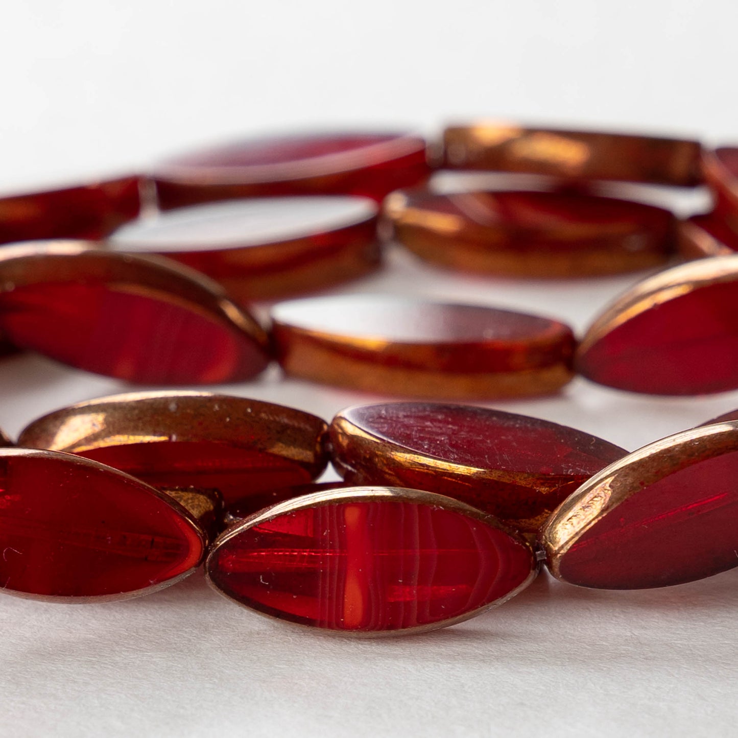 18mm Glass Spindle Beads - Red with Bronze Edges - 10 beads