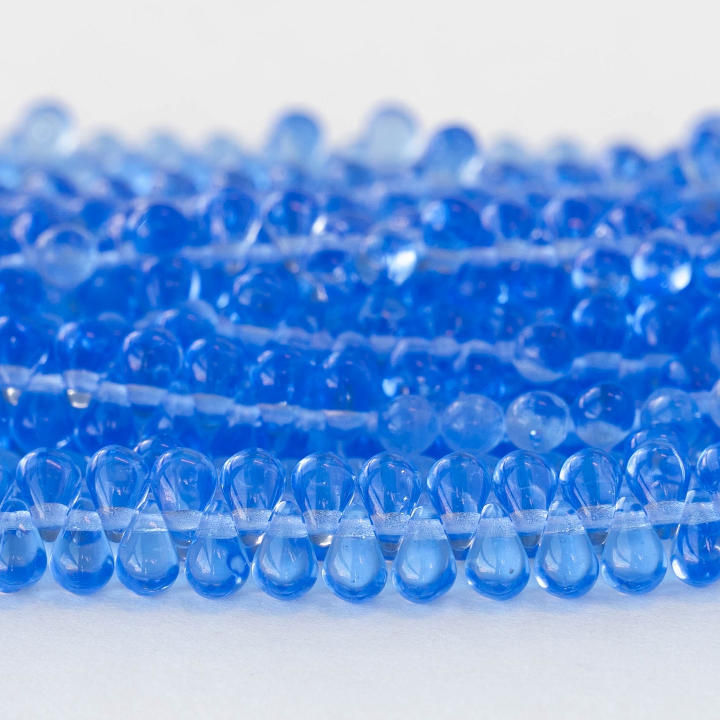 6x4mm Glass Teardrop Beads - Sapphire Blue - 100 Beads