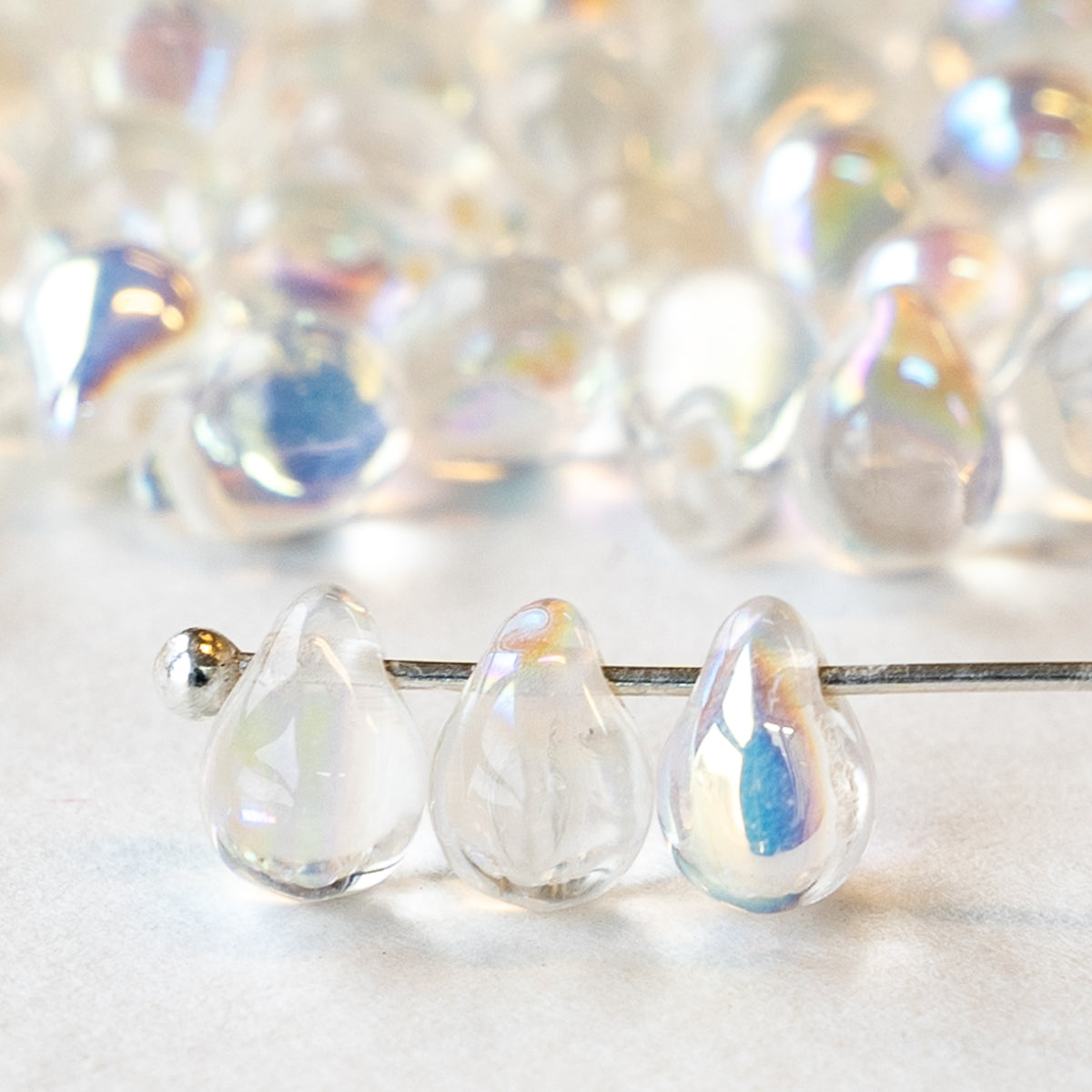 5x7mm Glass Teardrop Beads - Crystal with Silver Coat - 75 Beads –  funkyprettybeads