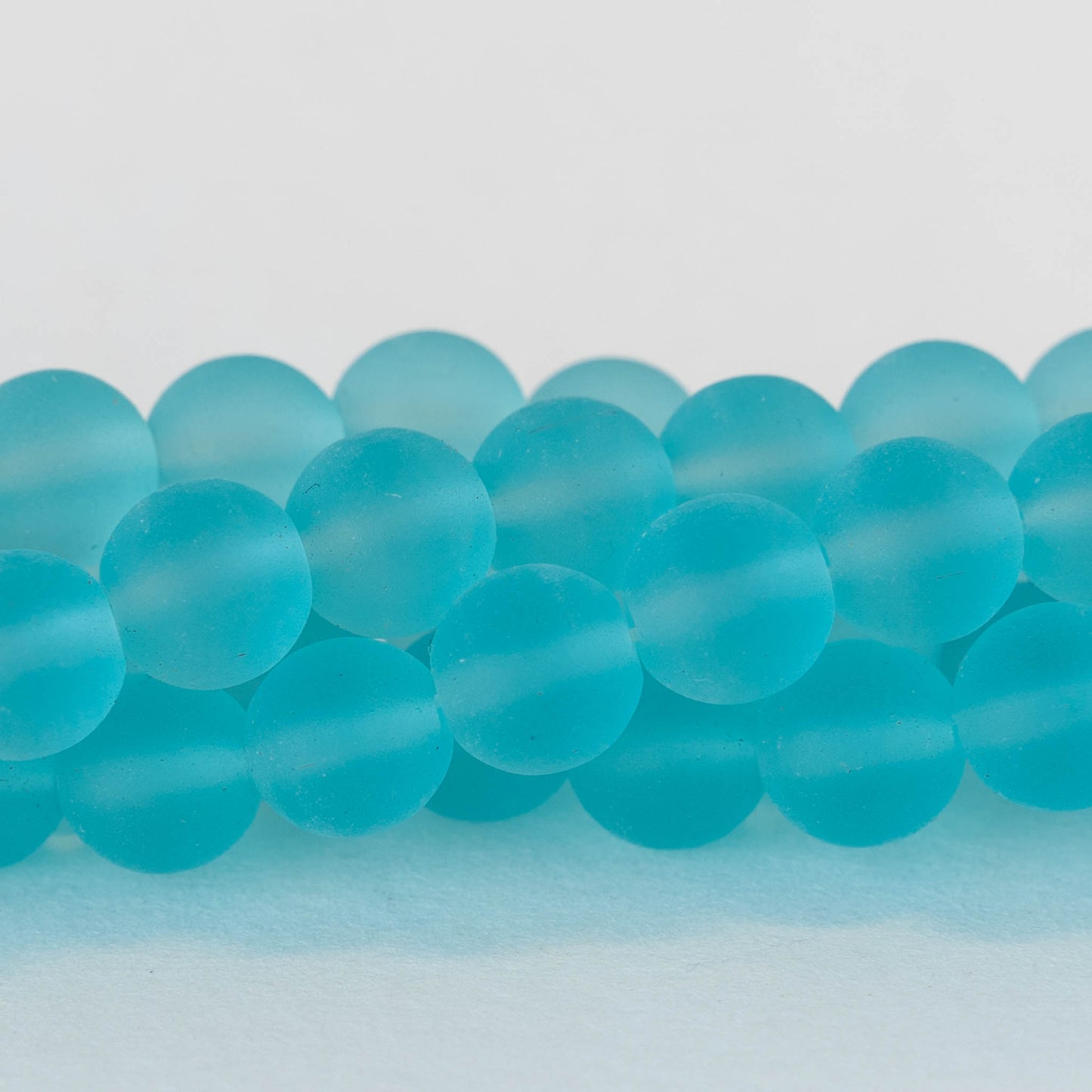 10mm Frosted Glass Rounds - Aqua - 21 beads