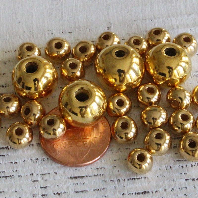 6-7mm 24K Gold Coated Ceramic Round Beads - Gold