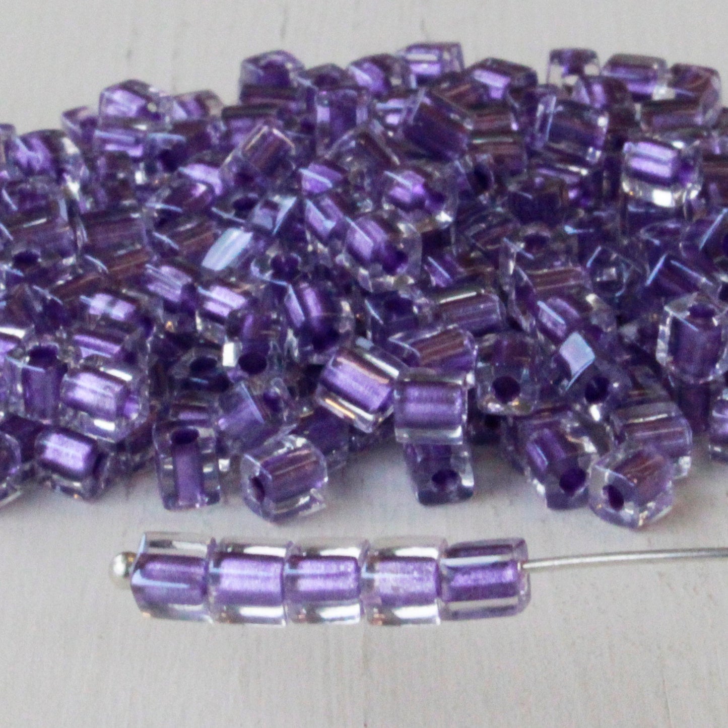 4mm Miyuki Cube Beads  - Purple Lined Crystal