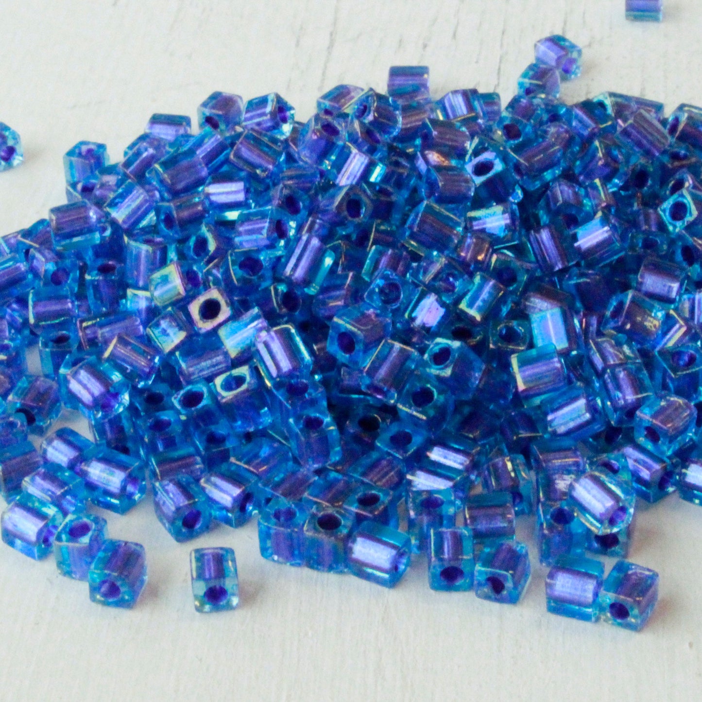 4mm Miyuki Cube Beads  - Purple Lined Aqua - 20 grams