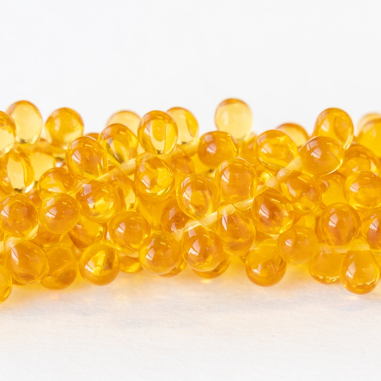 5x7mm Glass Teardrop Beads - Golden Yellow Amber - 45 Beads