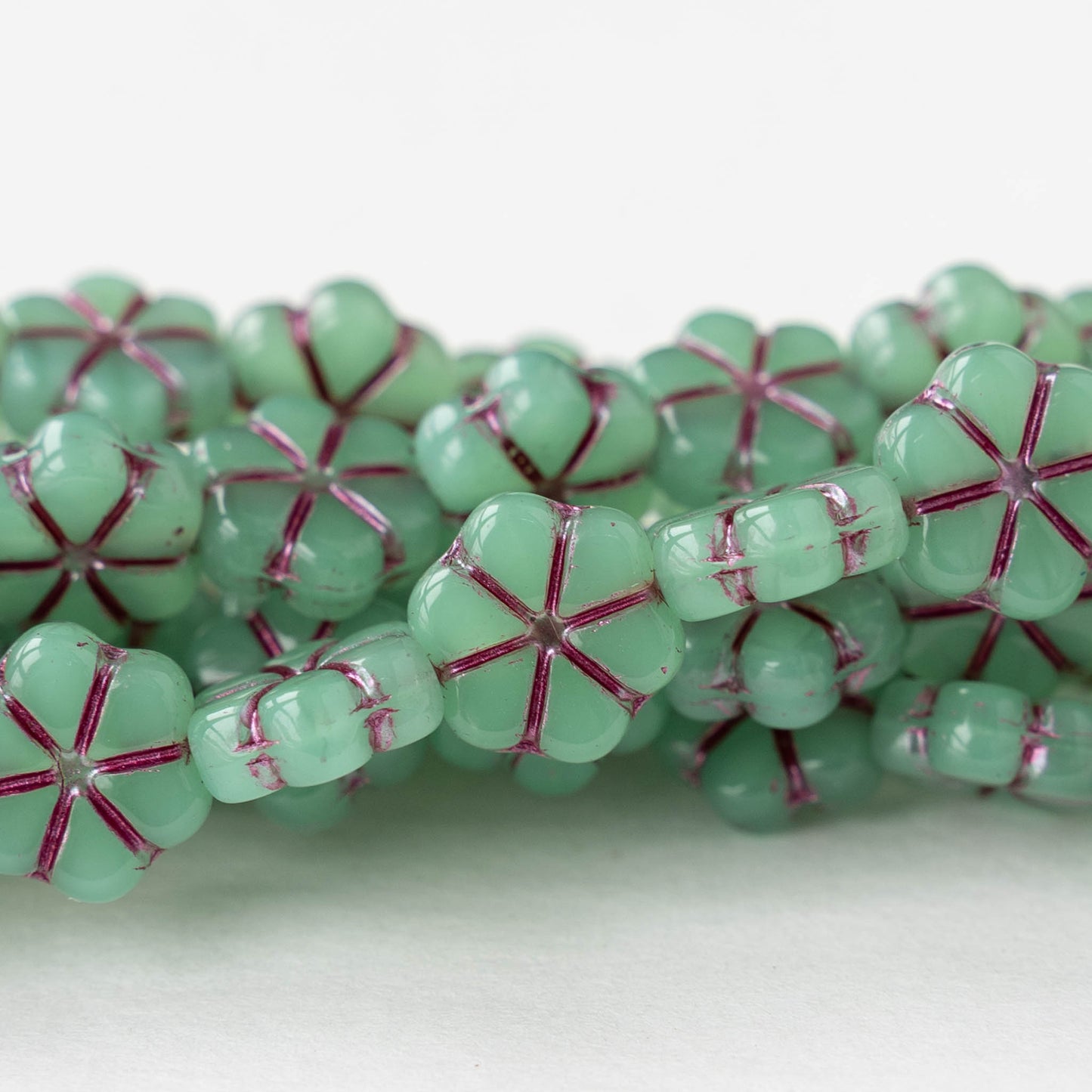 10mm Glass Flower Beads - Opaline Mint Green with Pink Wash - 15 beads