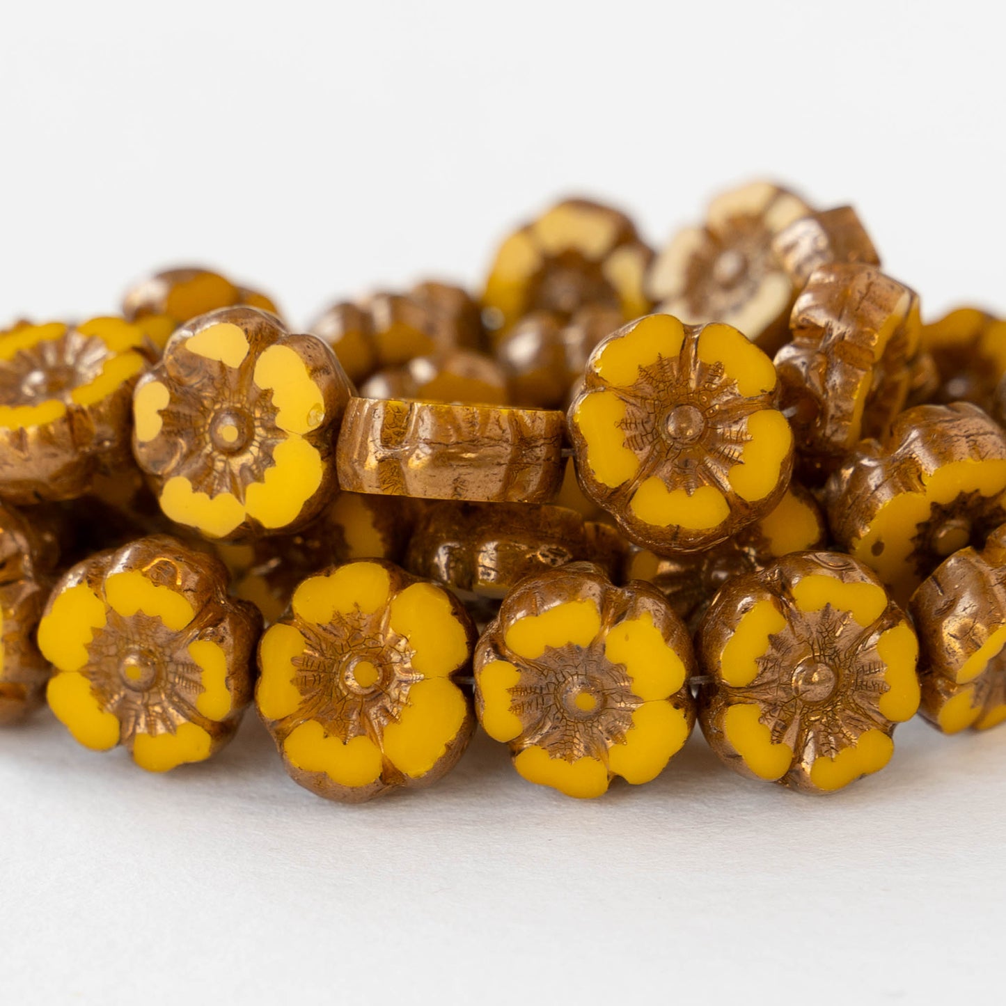 10mm Hibiscus Flower Bead - Opaque Ochre with Bronze Wash - 12 Beads