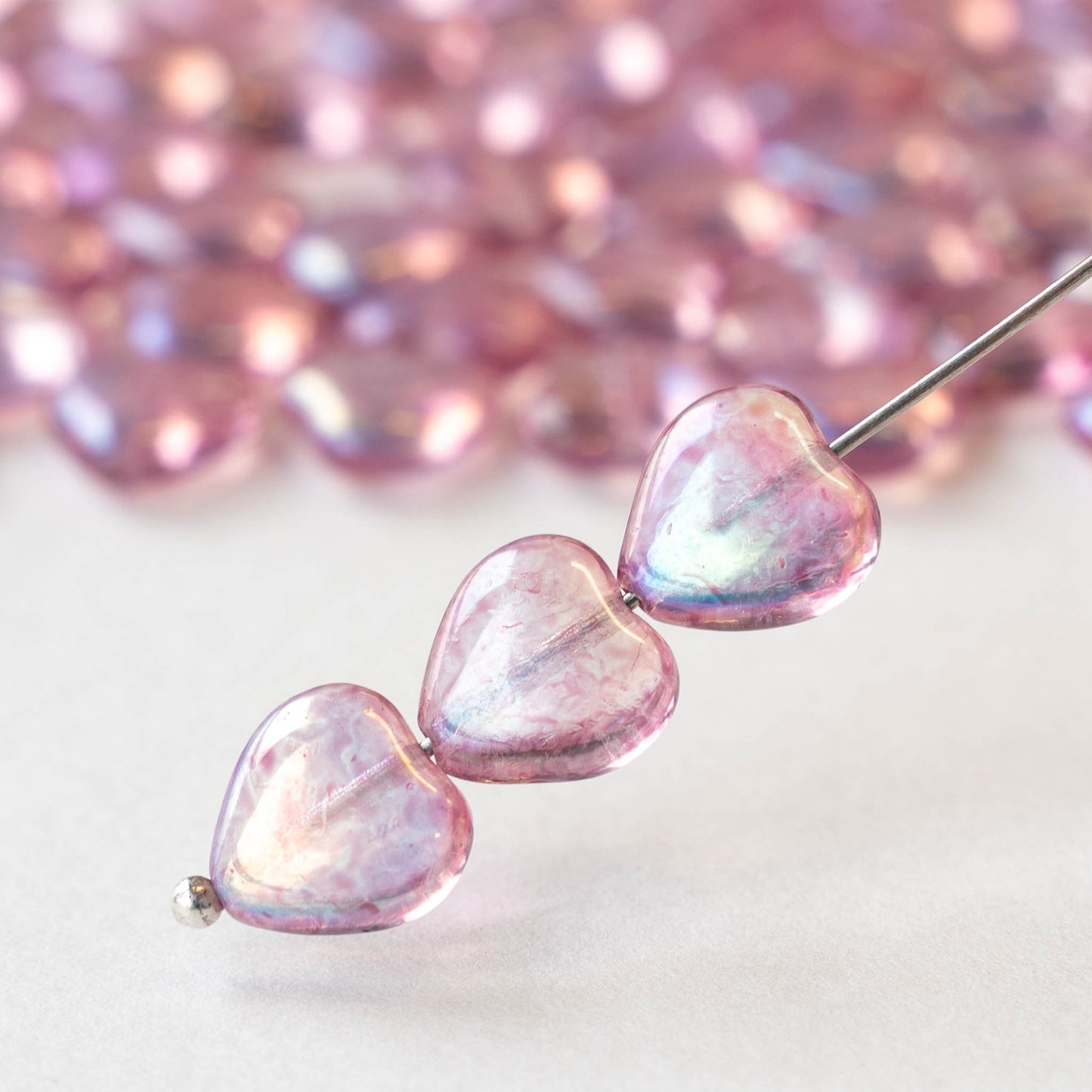 10mm Glass Heart Beads - Transparent Raspberry Pink Luster AB - 12 hearts