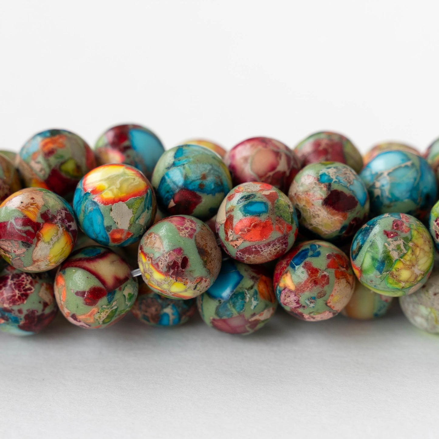 10mm Impression Jasper Round Beads - Rainbow - 15 inch strand ~37 beads