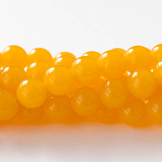 Round Beads - 10mm - Resin - Opaline Yellow - 16 inch strand ~40 beads
