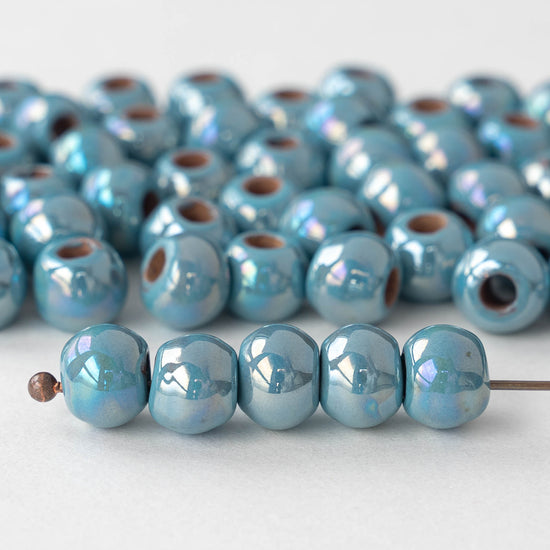 Load image into Gallery viewer, 10mm Glazed Ceramic Round Beads - Iridescent Light Blue
