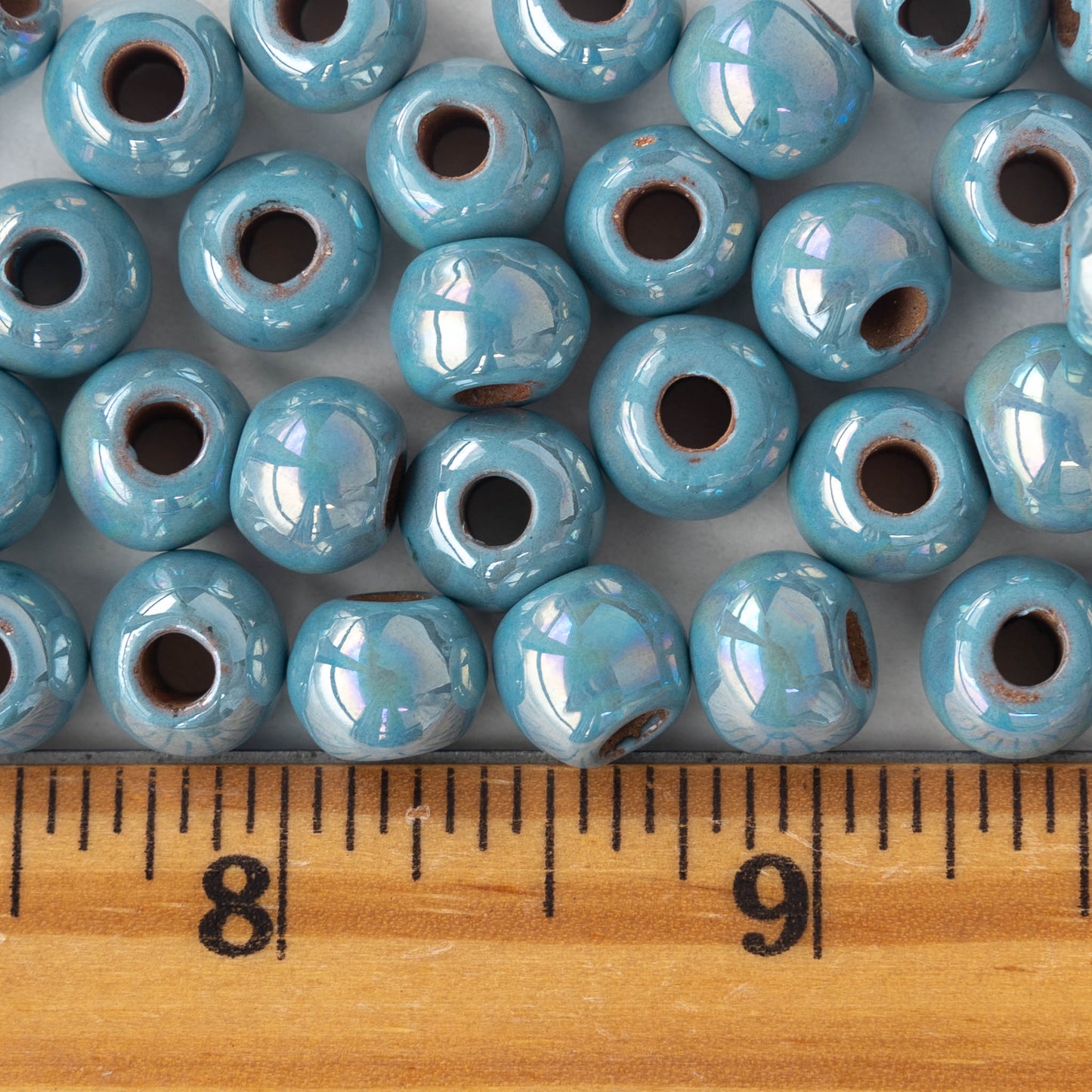 10mm Glazed Ceramic Round Beads - Iridescent Light Blue