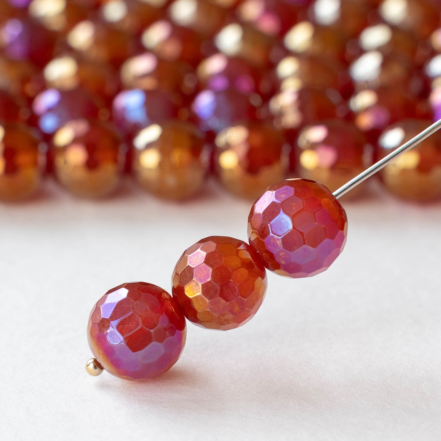 10mm Round Faceted Plated Carnelian Beads - Whole or Half Strand