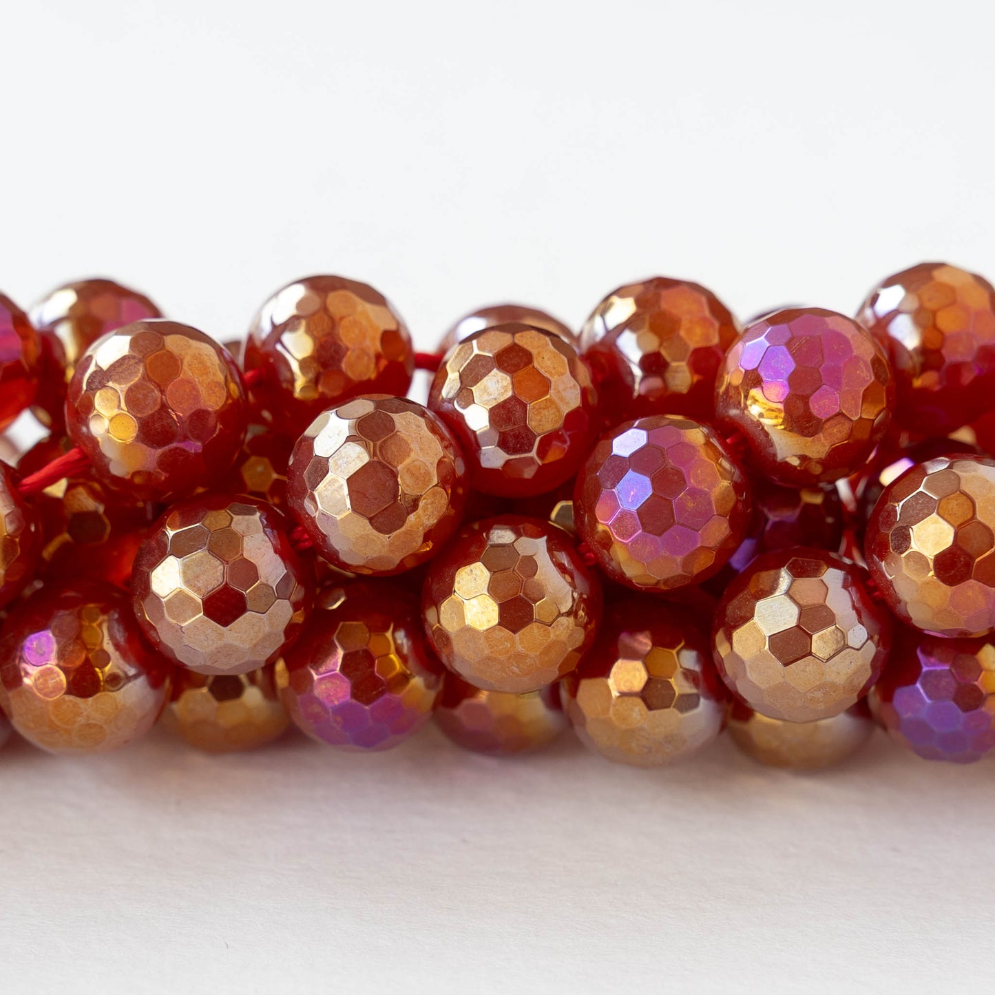 10mm Round Faceted Plated Carnelian Beads - Whole or Half Strand