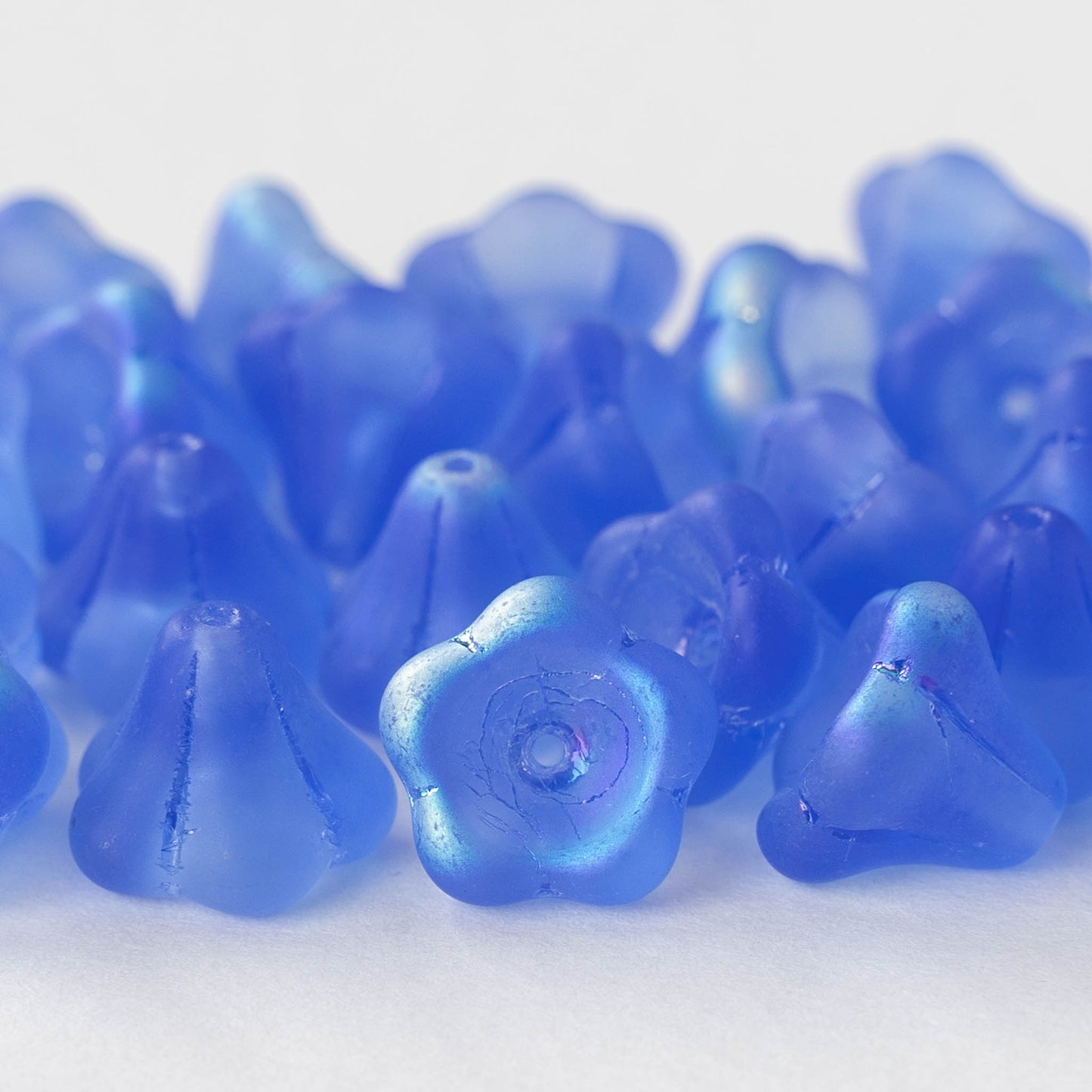 Load image into Gallery viewer, 10x12mm Trumpet Flower Beads - Sapphire Blue AB - 10 beads

