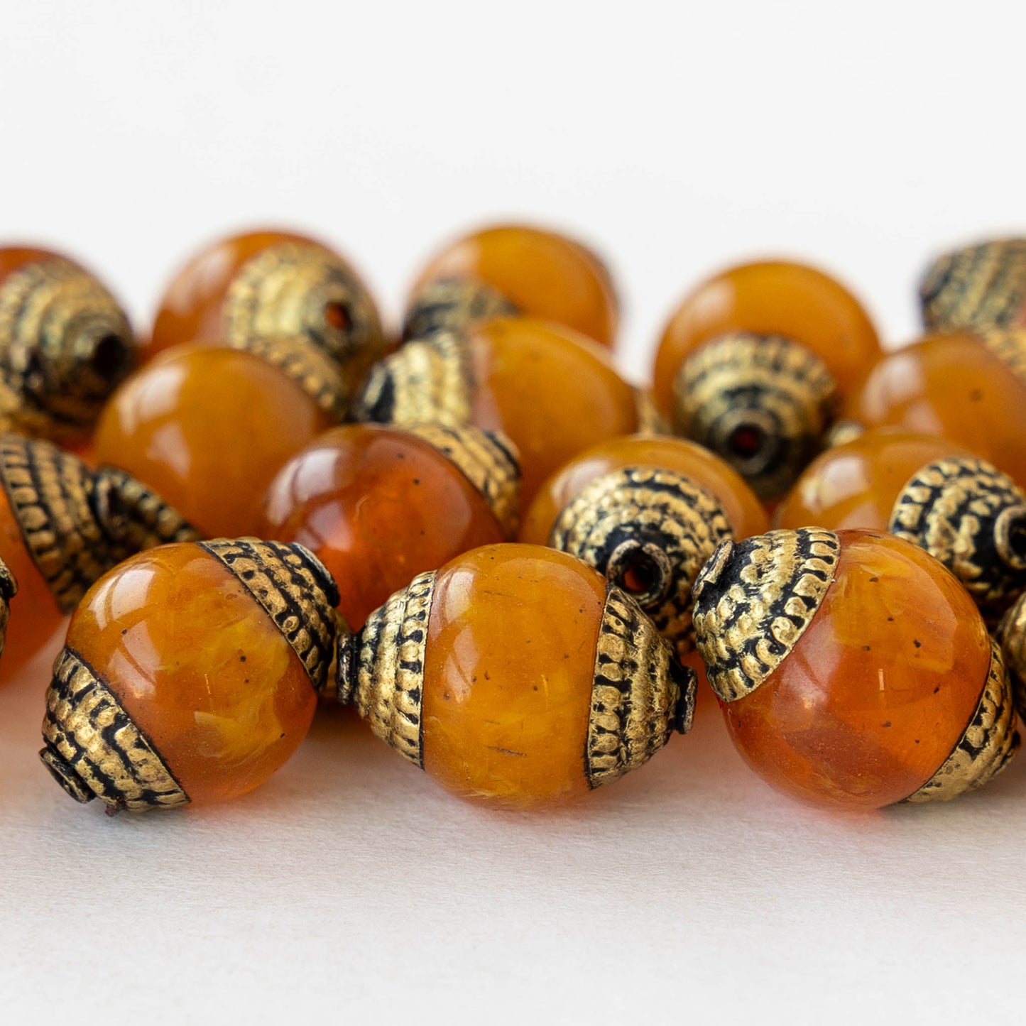 10x14mm Capped Rounds Resin Beads - Orange with Brass Accents - 2 beads