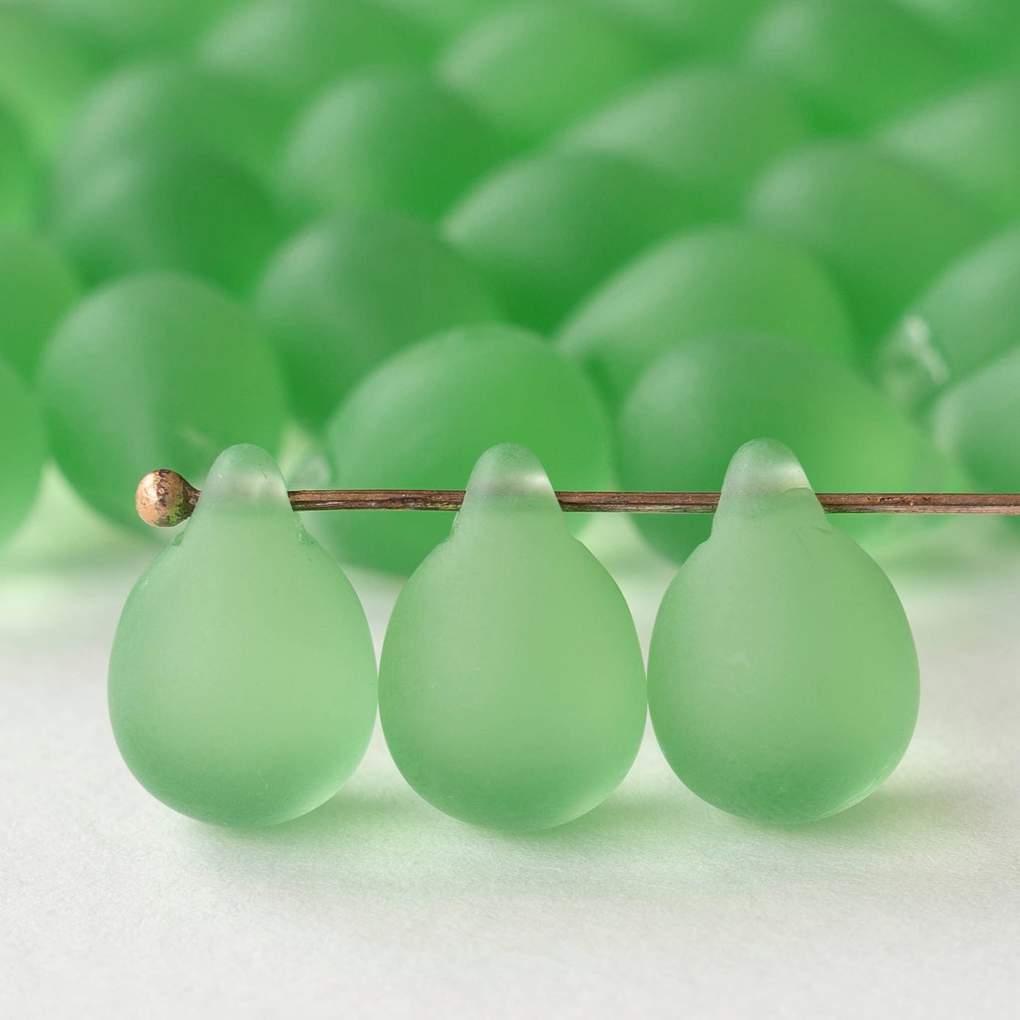 10x14mm Glass Teardrop Beads - Light Green Matte - 12 beads