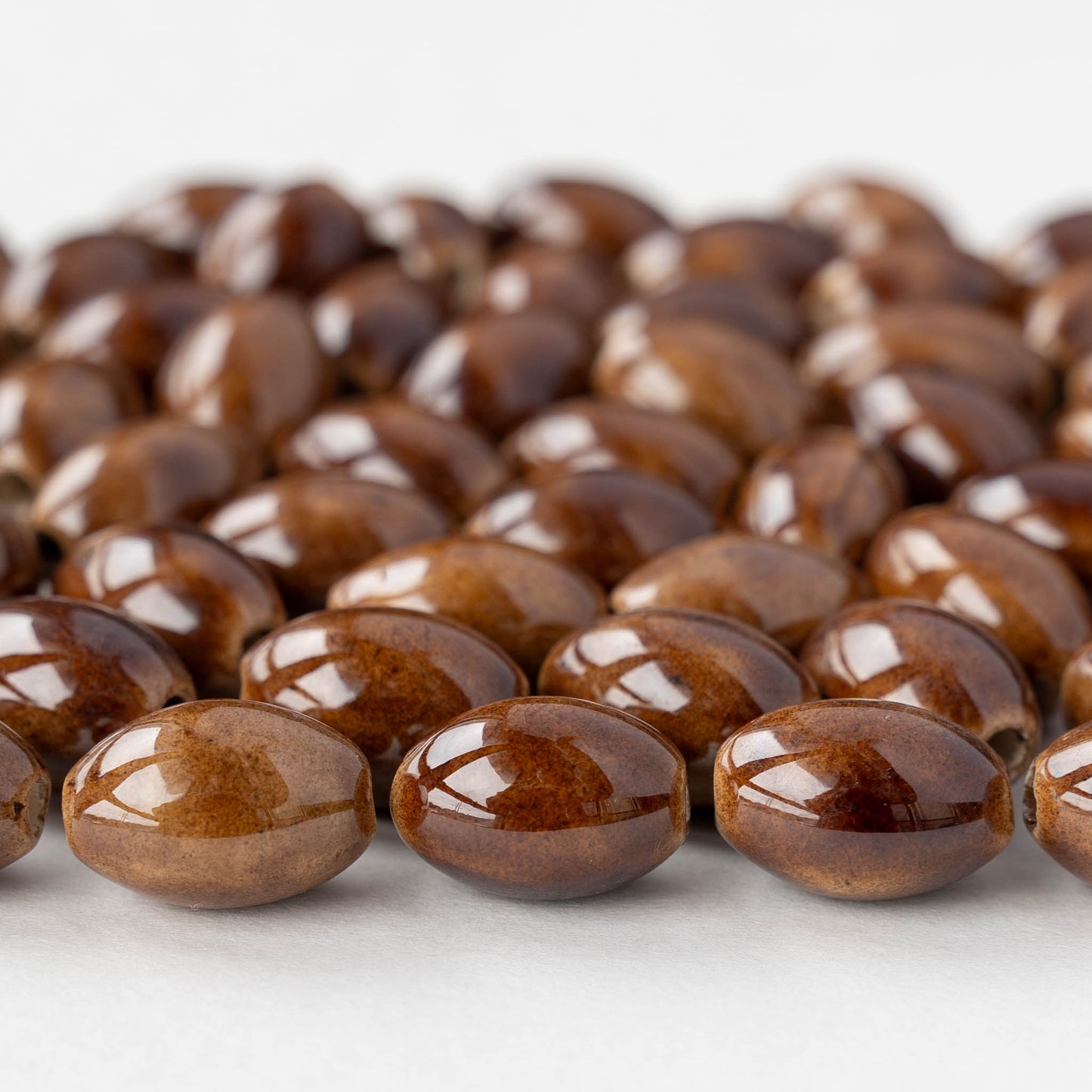 10x15mm Glazed Ceramic Oval Beads - Brown - 4 or 12 beads