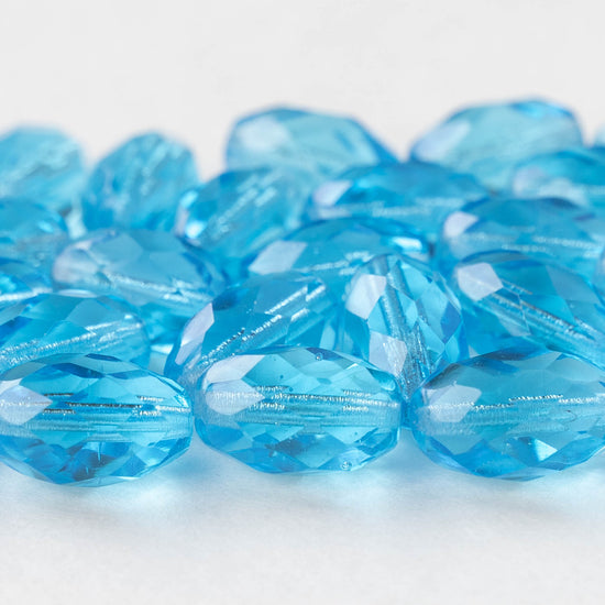 Load image into Gallery viewer, 10x15mm Firepolished Glass Oval Beads - Aqua  - 8 Beads
