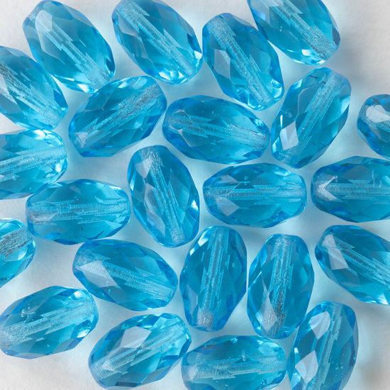 Load image into Gallery viewer, 10x15mm Firepolished Glass Oval Beads - Aqua  - 8 Beads
