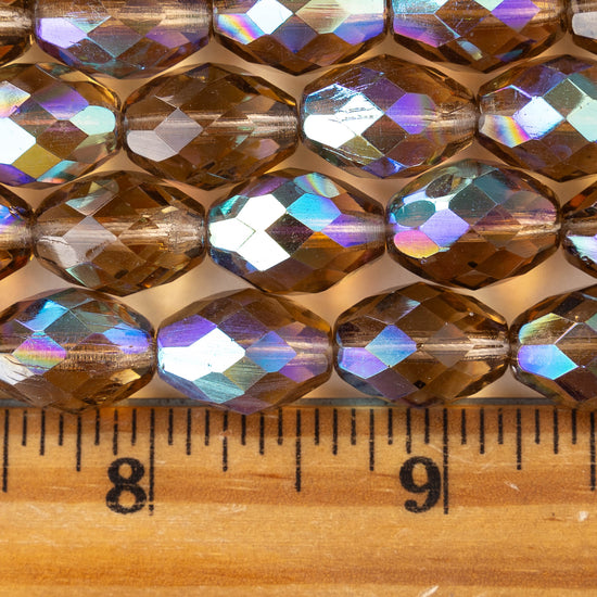 10x15mm Firepolished Glass Oval Beads - Transparent Smokey Topaz AB - 4 beads