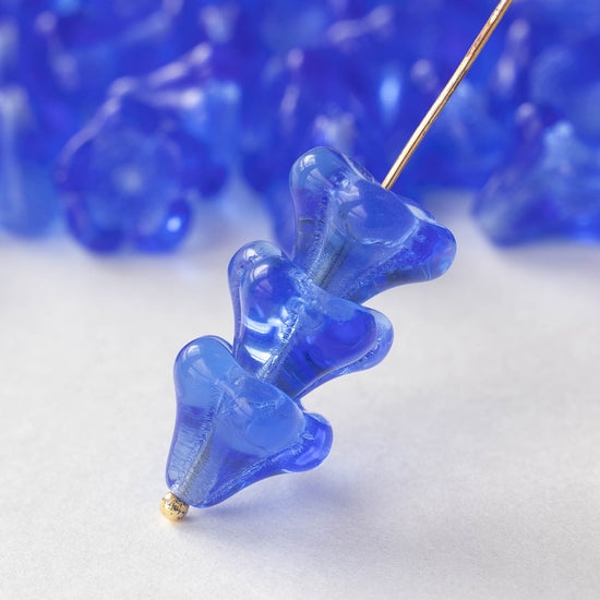10x12mm Trumpet Flower Beads - Transparent Blue - 10 or 30 –  funkyprettybeads