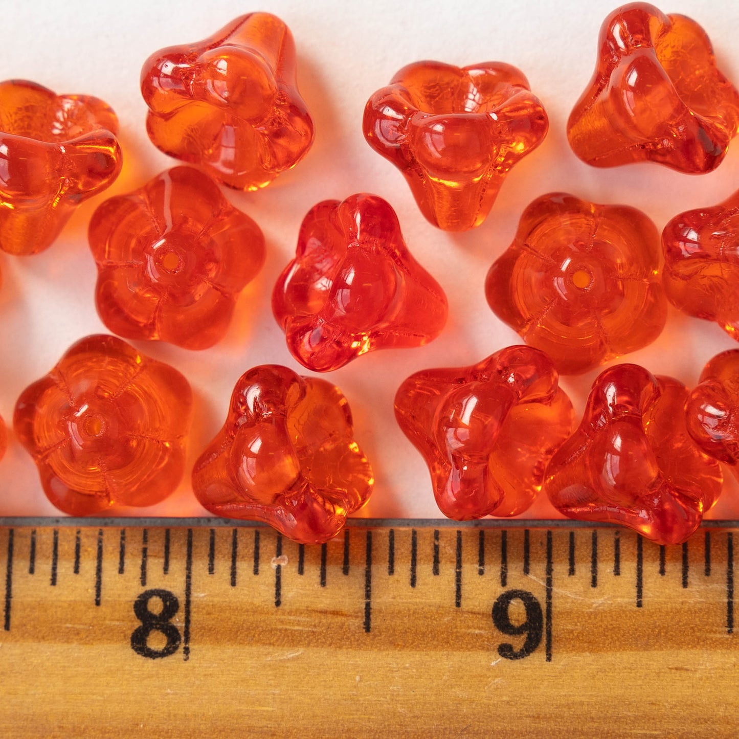 10x12mm Trumpet Flower Beads - Transparent Dk. Orange - 10 or 30